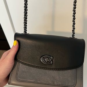 Coach purse - never used. Got as a gift a few years ago and never wore it
